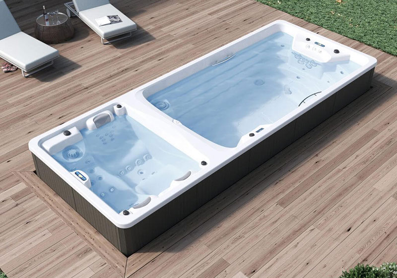 Spa de nage Swimspa BI600 sur terrasse bois - Photo non contractuelle