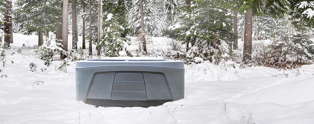 Spa portable 4 places Feel It sous la neige